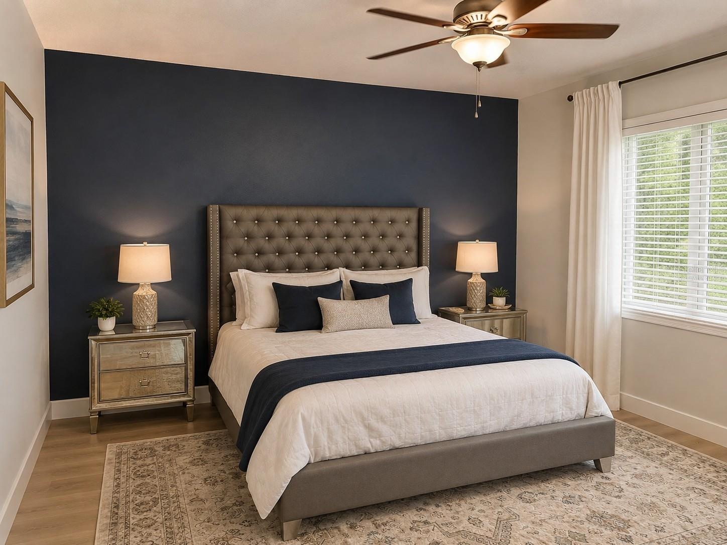 14048 Larkspur Lake Dr - Spacious Master suite with accent wall and abundant natural light. Virtually staged.
