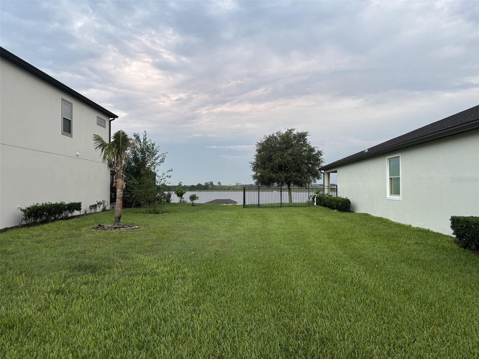 14048 Larkspur Lake Dr - Generous separation between neighboring homes provides added privacy and open space.