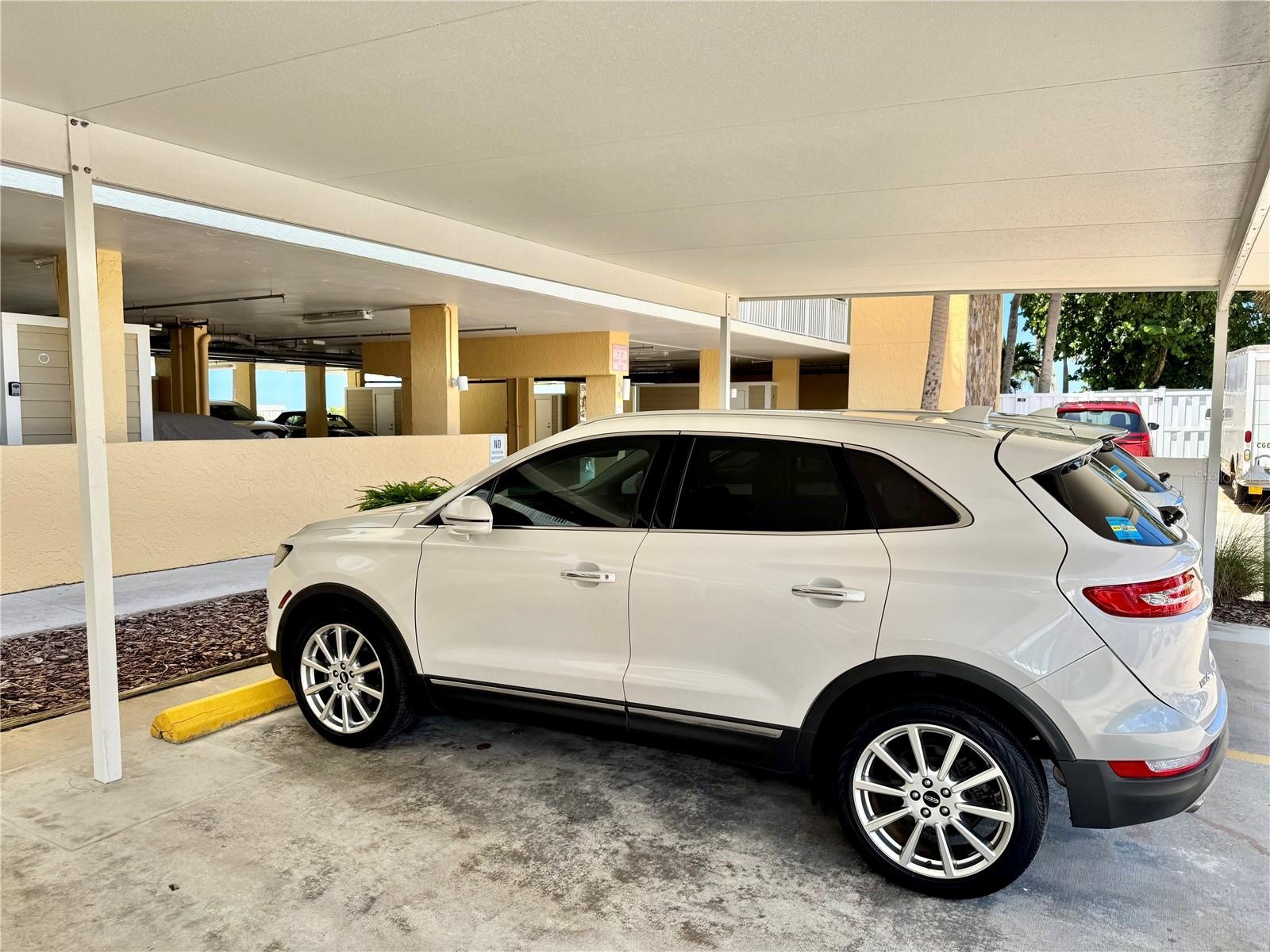 Covered Parking Space #304 (assigned/deeded) is easy to access and conveniently near lobby door.