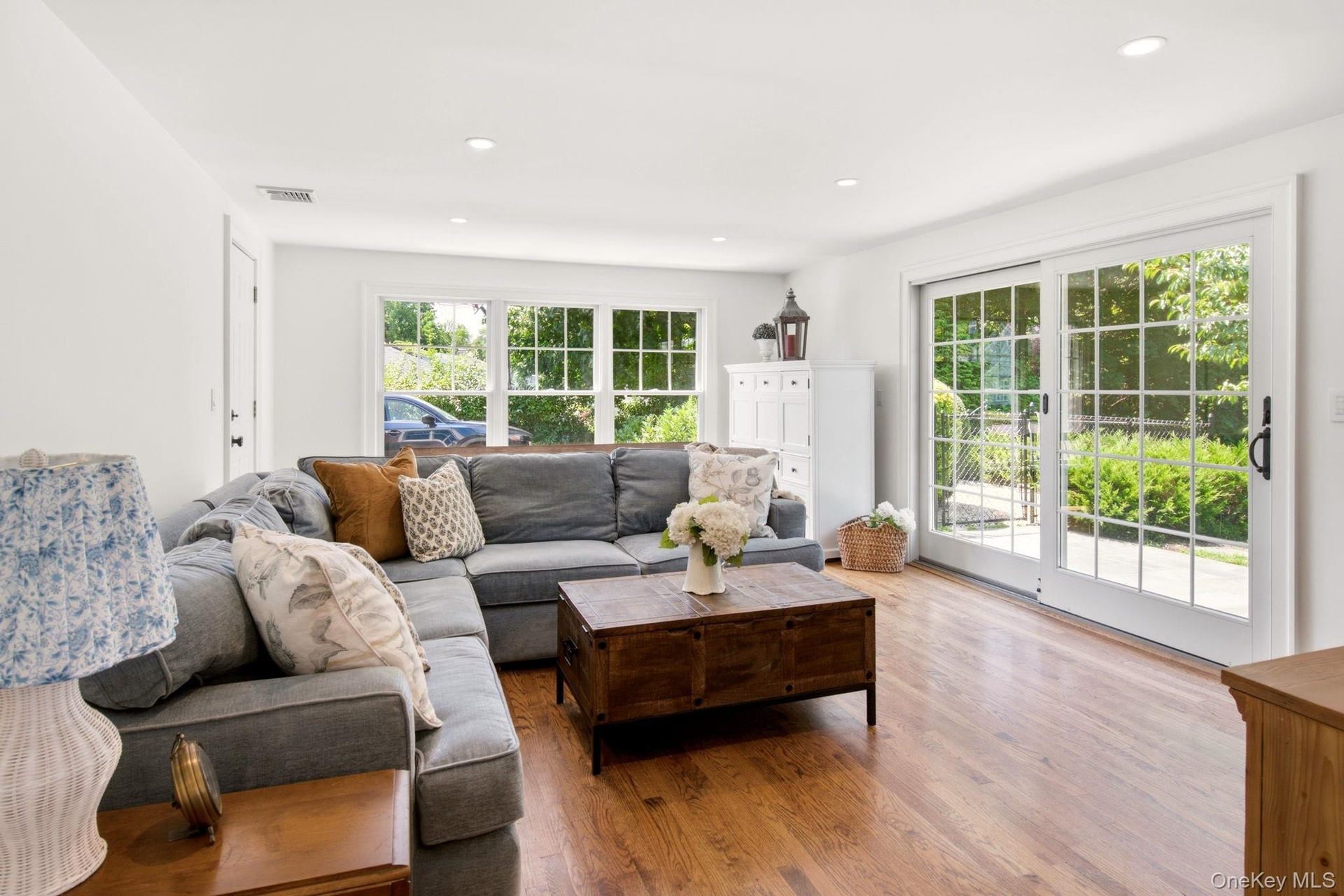 Inviting Den off of the Dining Room with entrance to the yard and garage.