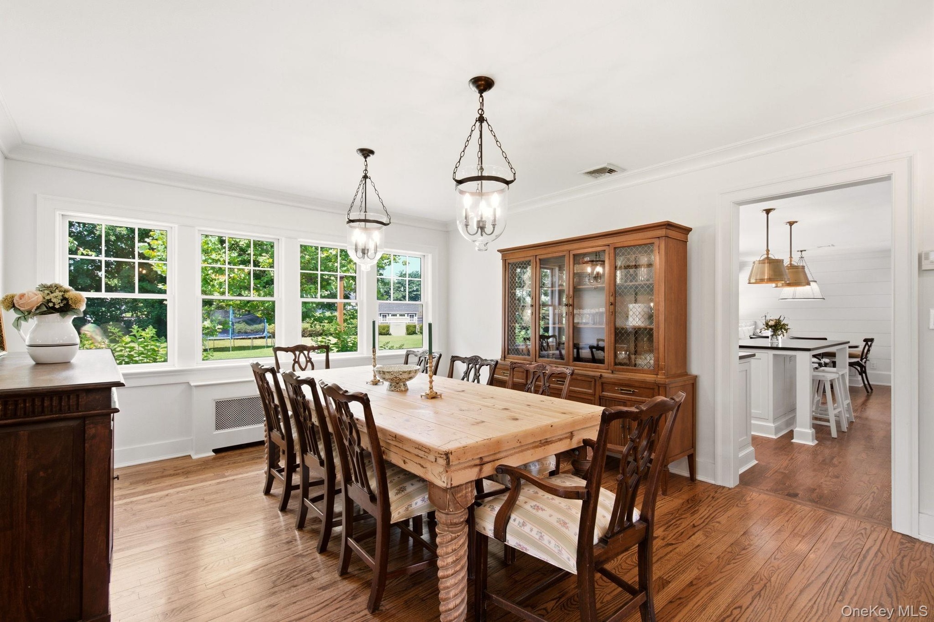 Adjoining Kitchen offers easy flow for entertaining.
