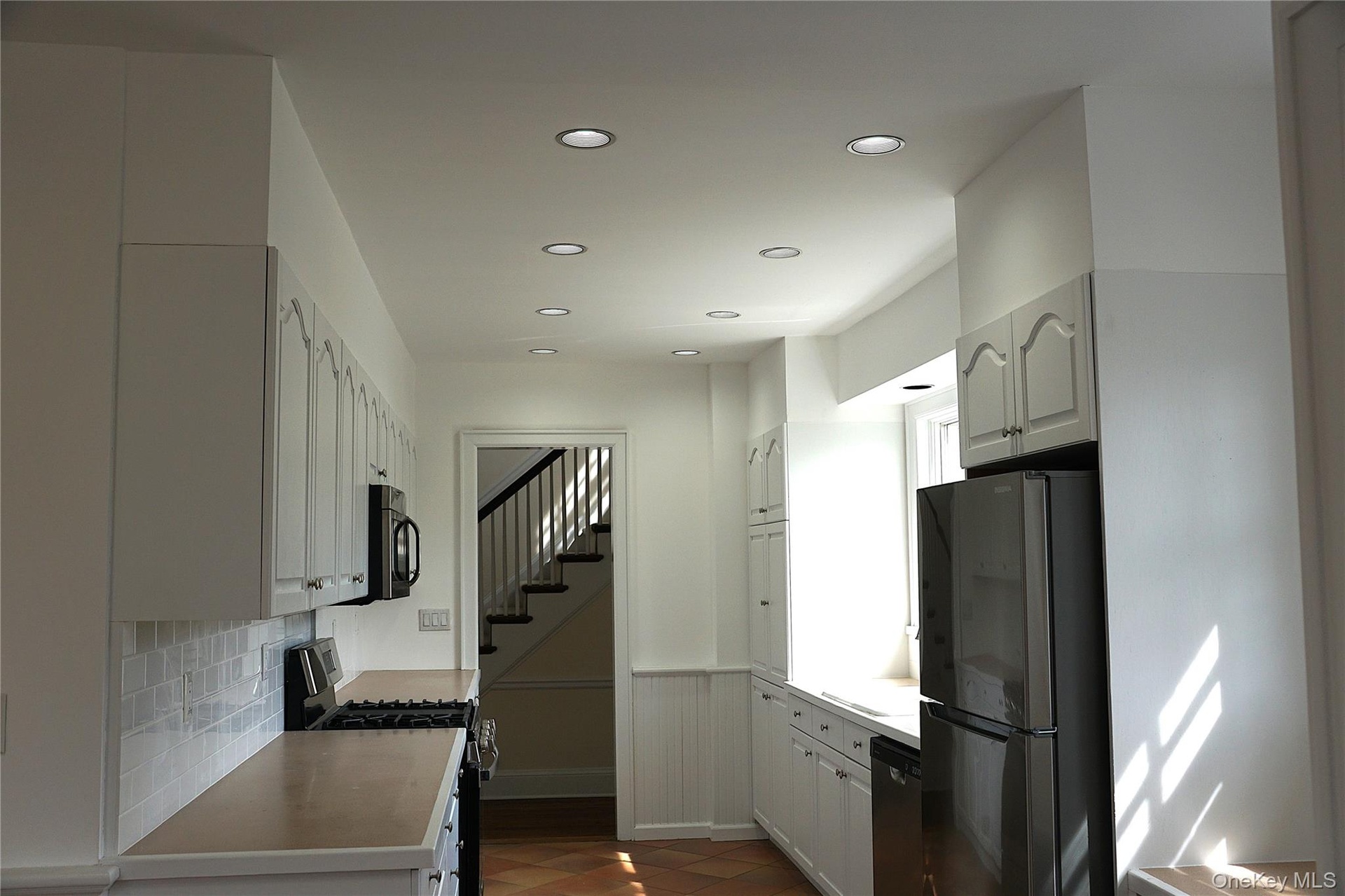 I think you would like this kitchen with your own washer and dryer right there>>>