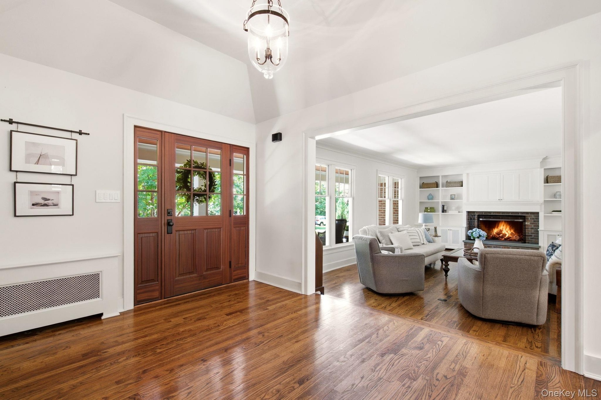 Gleaming hardwood floors are found throughout.