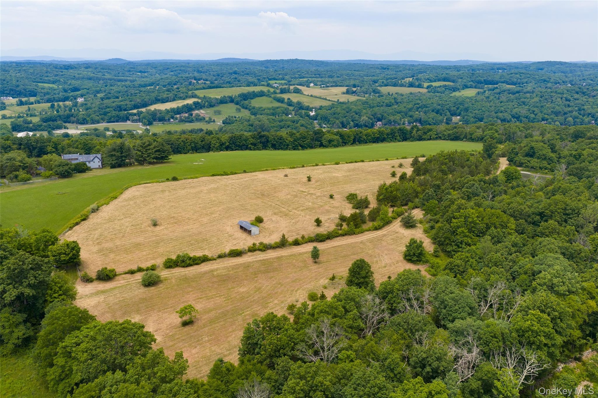 Recently mowed area -the top field could be a perfect house site