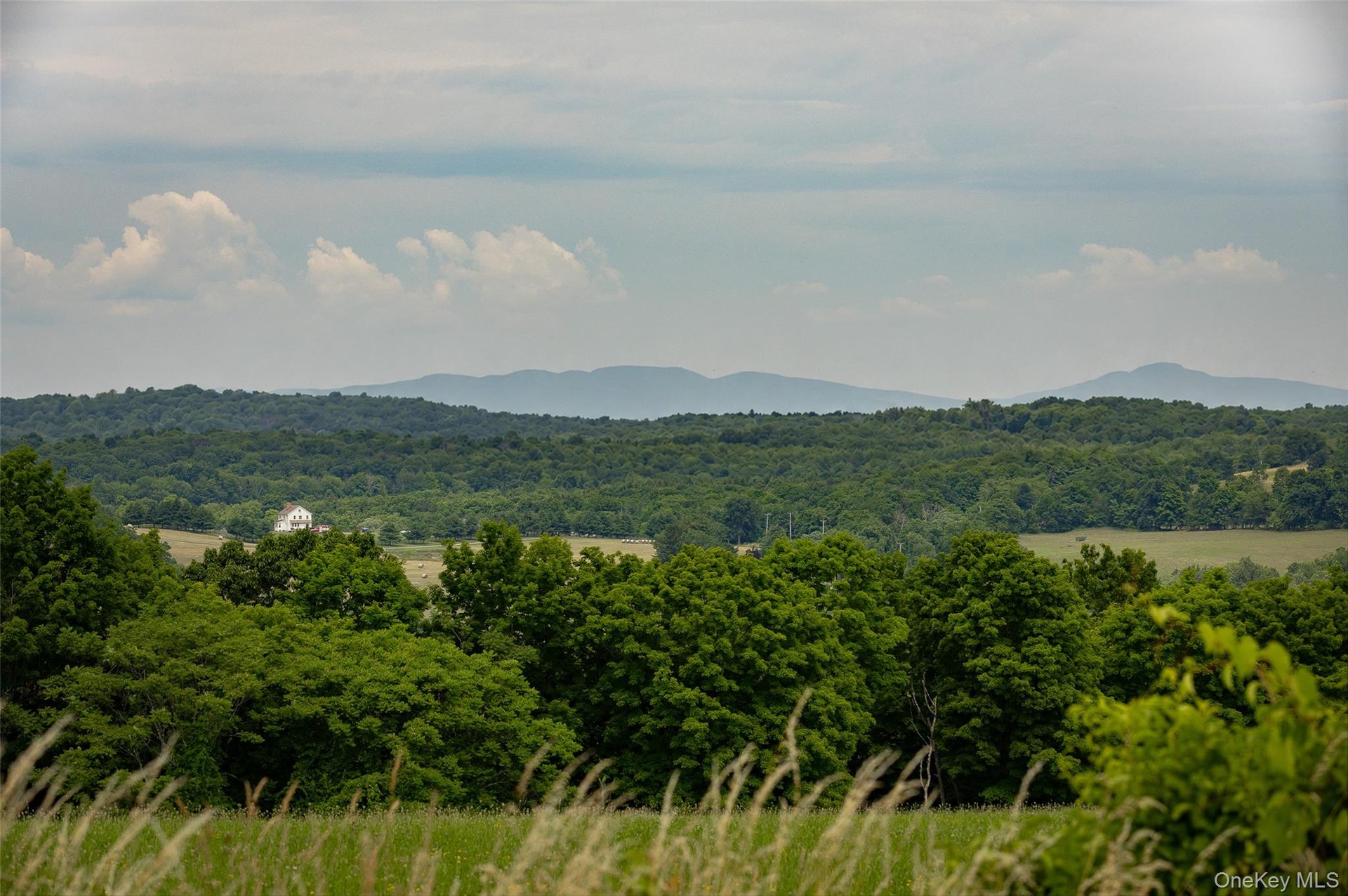 Photo from the same spot, showing different mountain peak expanse