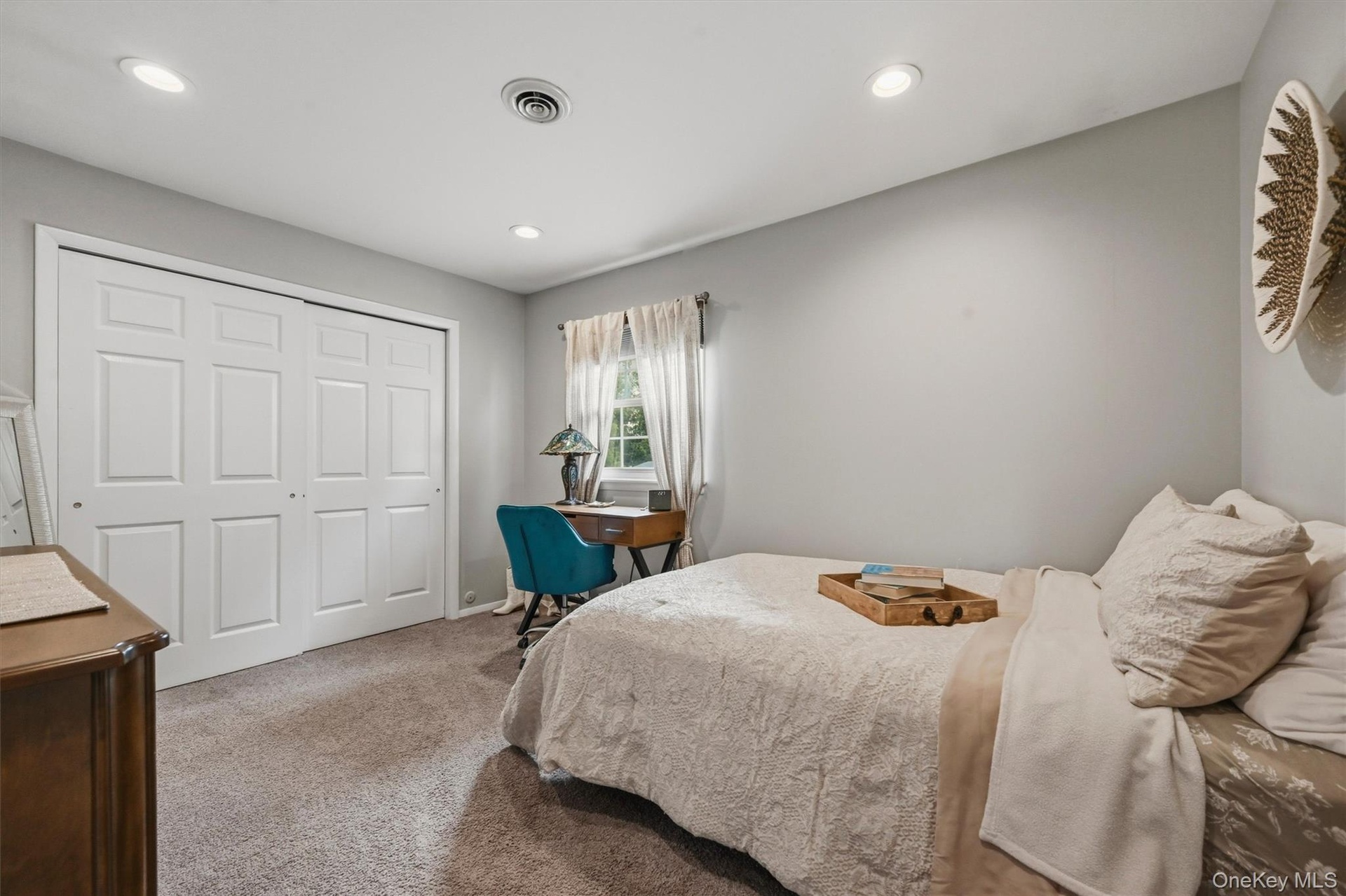 The third guest bedroom is of ample size with double door deep closets.