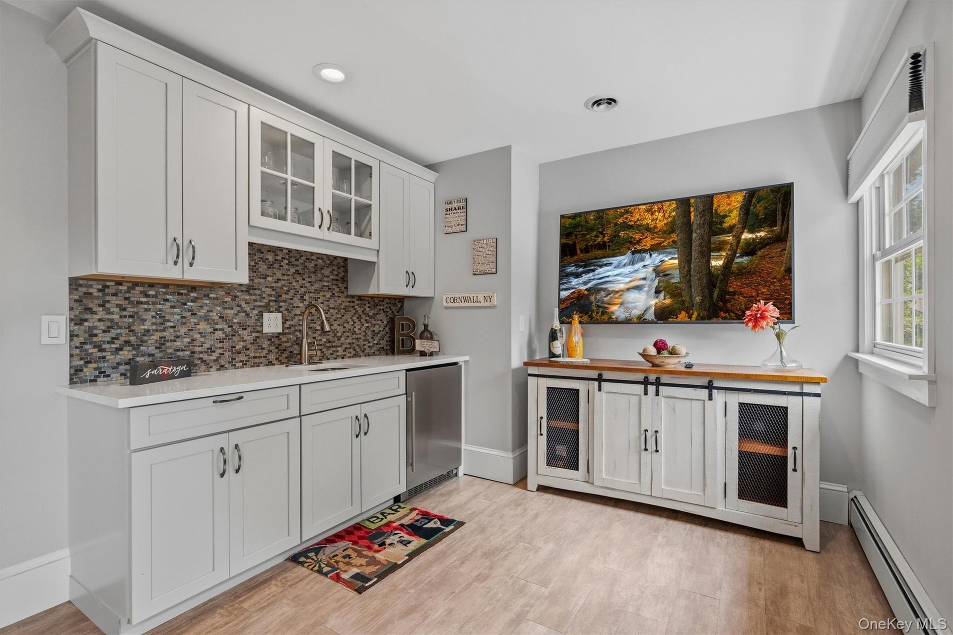 The beverage bar keeps cold drinks on hand and wet bar area makes clean up easy.
