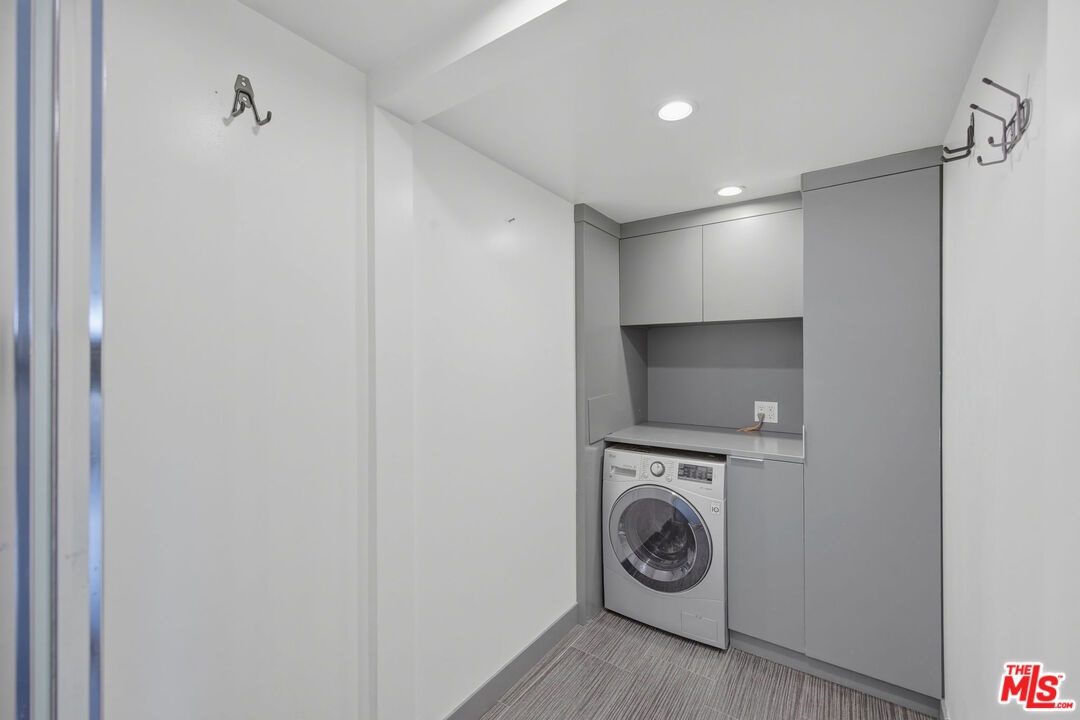 Laundry room in unit