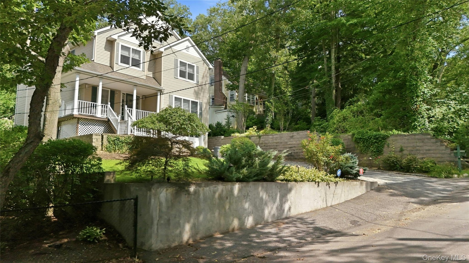 2 more parking spots in front of house