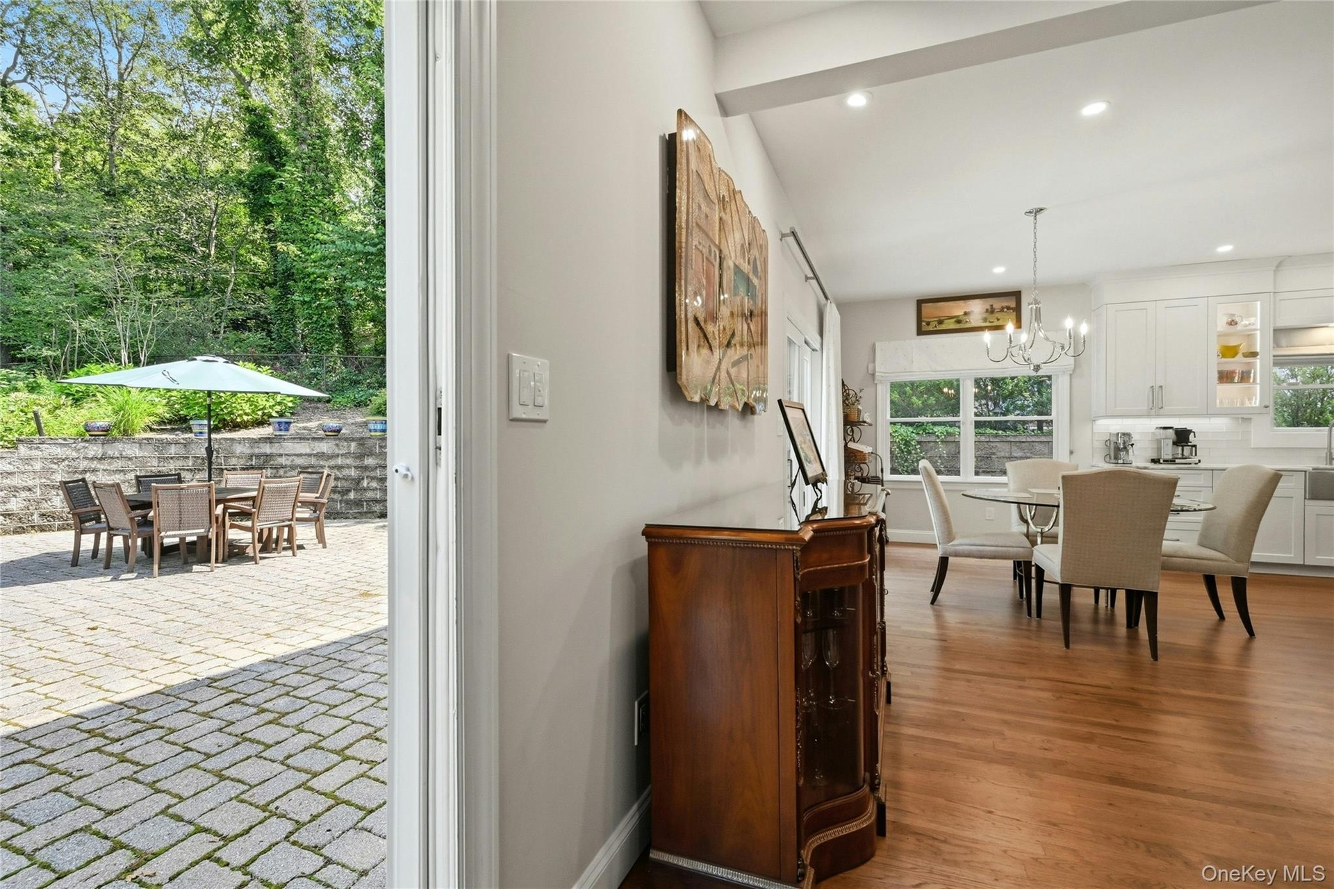 View of outdoor patio and kitchen seating area