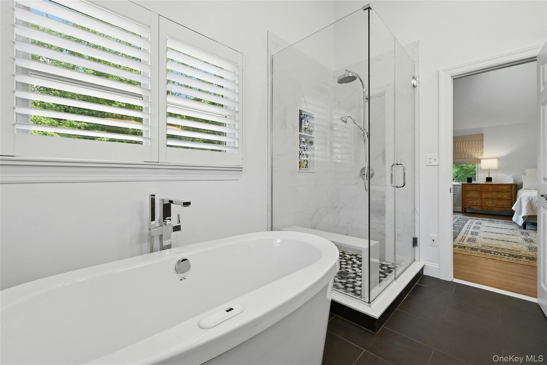 Walk-in shower and soaking tub, custom plantation shutters