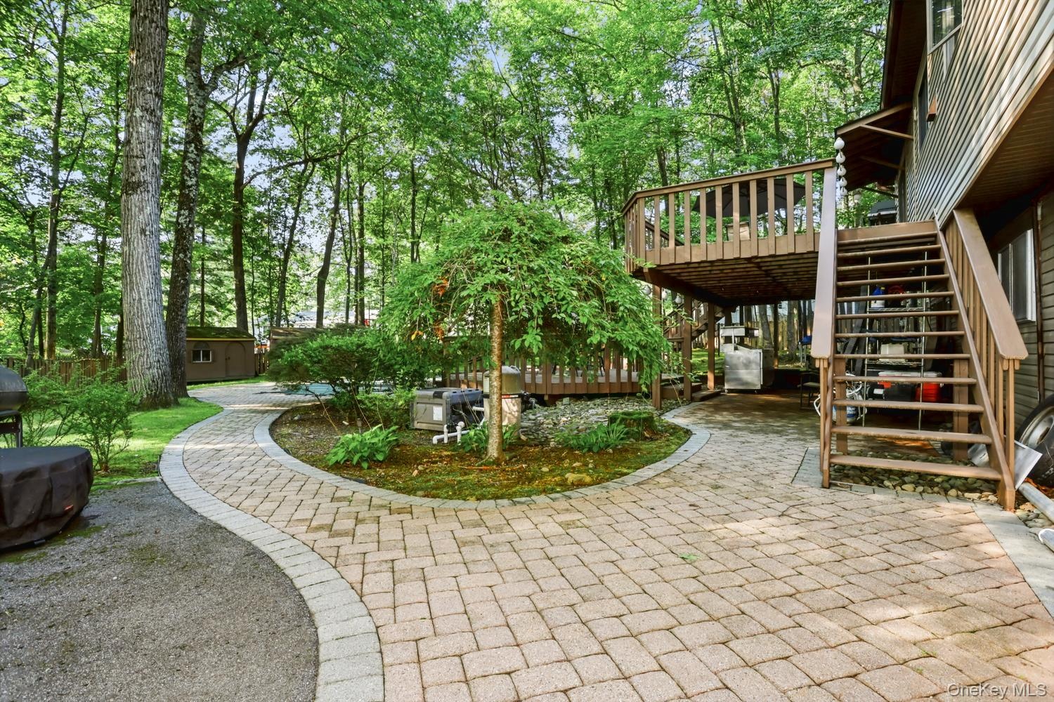 Paver patio with 2 level deck