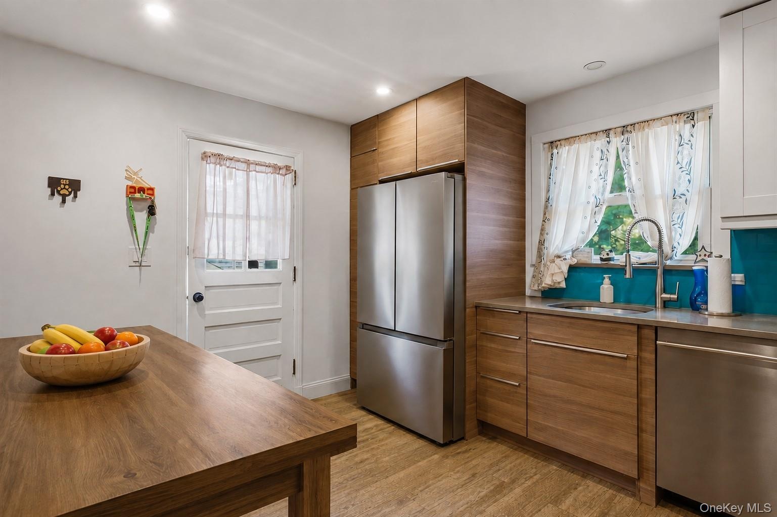with table and door to garden/patio