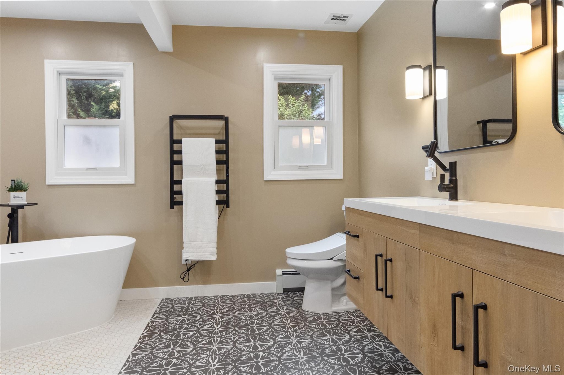 Light some candles,  put on soft music, warm up the towels and say "Calgon: Take me away."