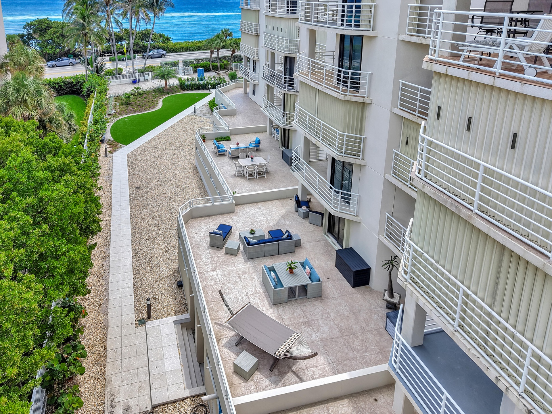 Birds-Eye View of Exceptional Patio (approximately 1,100 sq ft), private outdoor terrace. An impressive extension of the condo with abundant space for