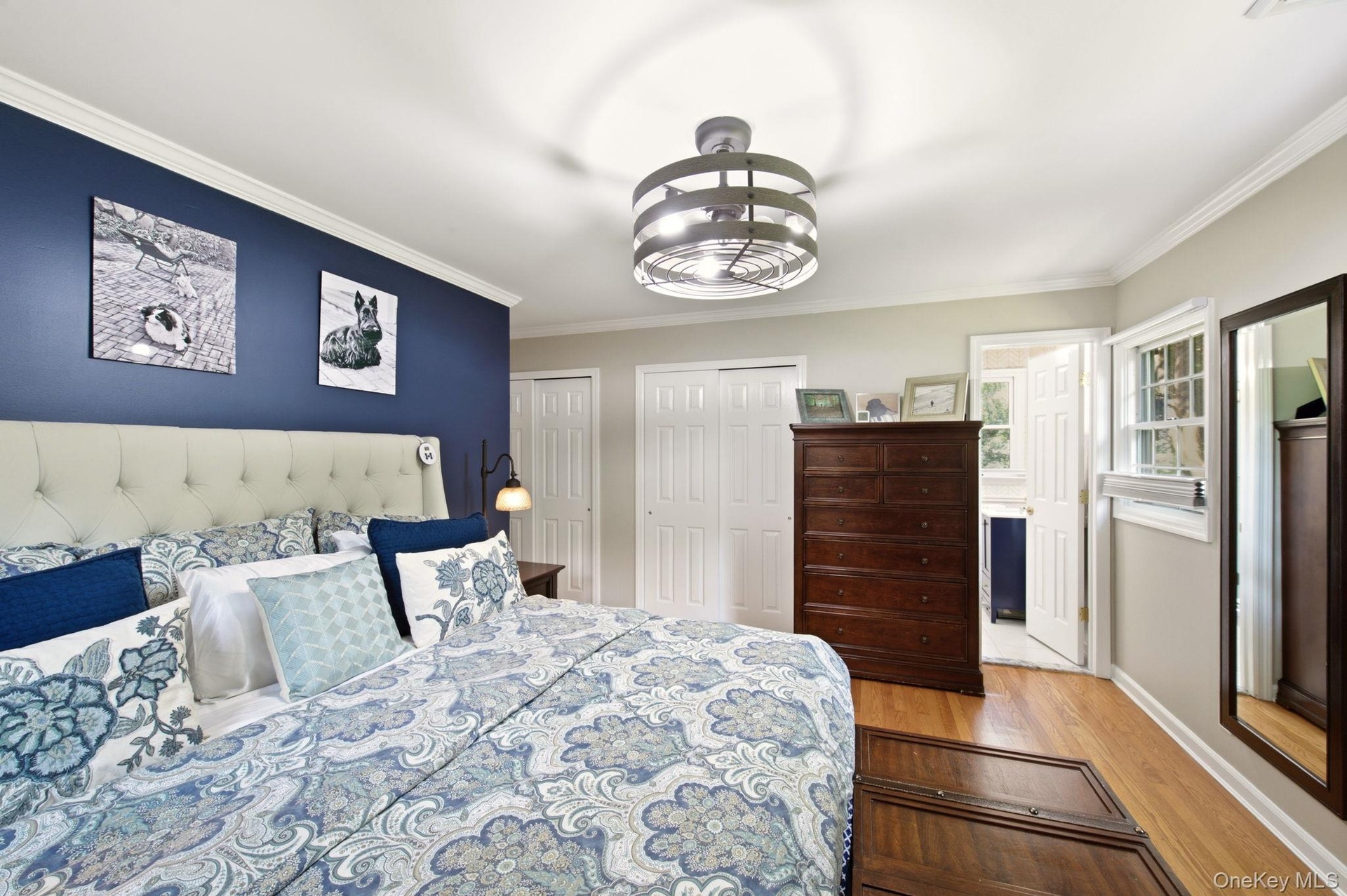 Moldings and Contemporary Light Fixtures adorn room2 Closets