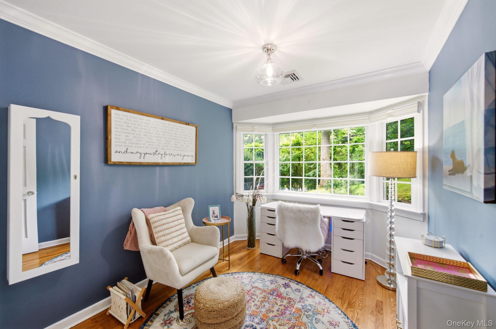 Bright and Cheerful Bay Window adorns this picturesque Bedroom