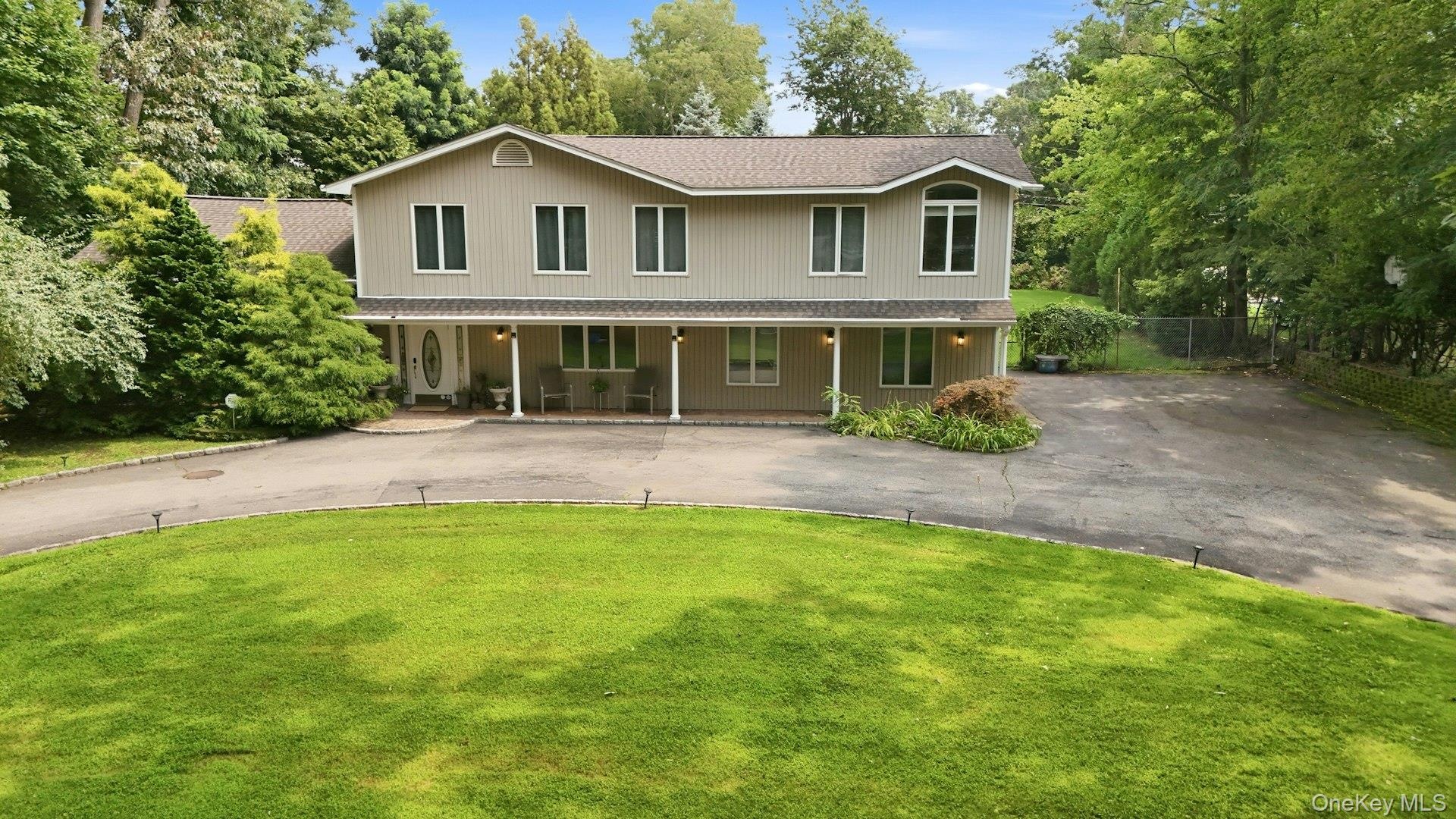 circular driveway offers ample parking