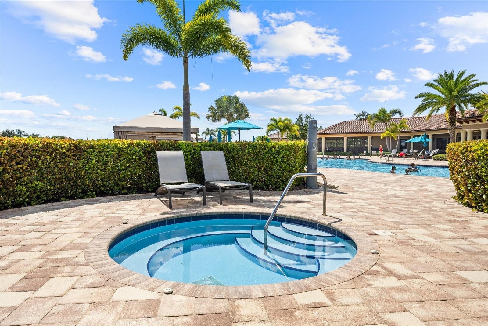 Relaxing Spa Steps Away from the Community Pool