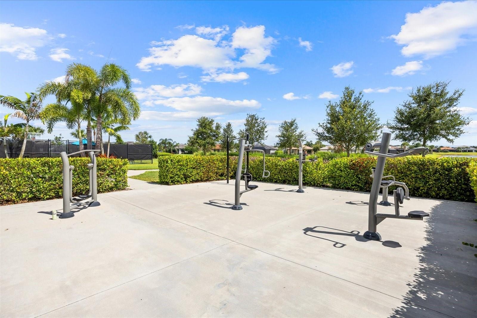 Outdoor Fitness Area Surrounded by Tropical Landscaping