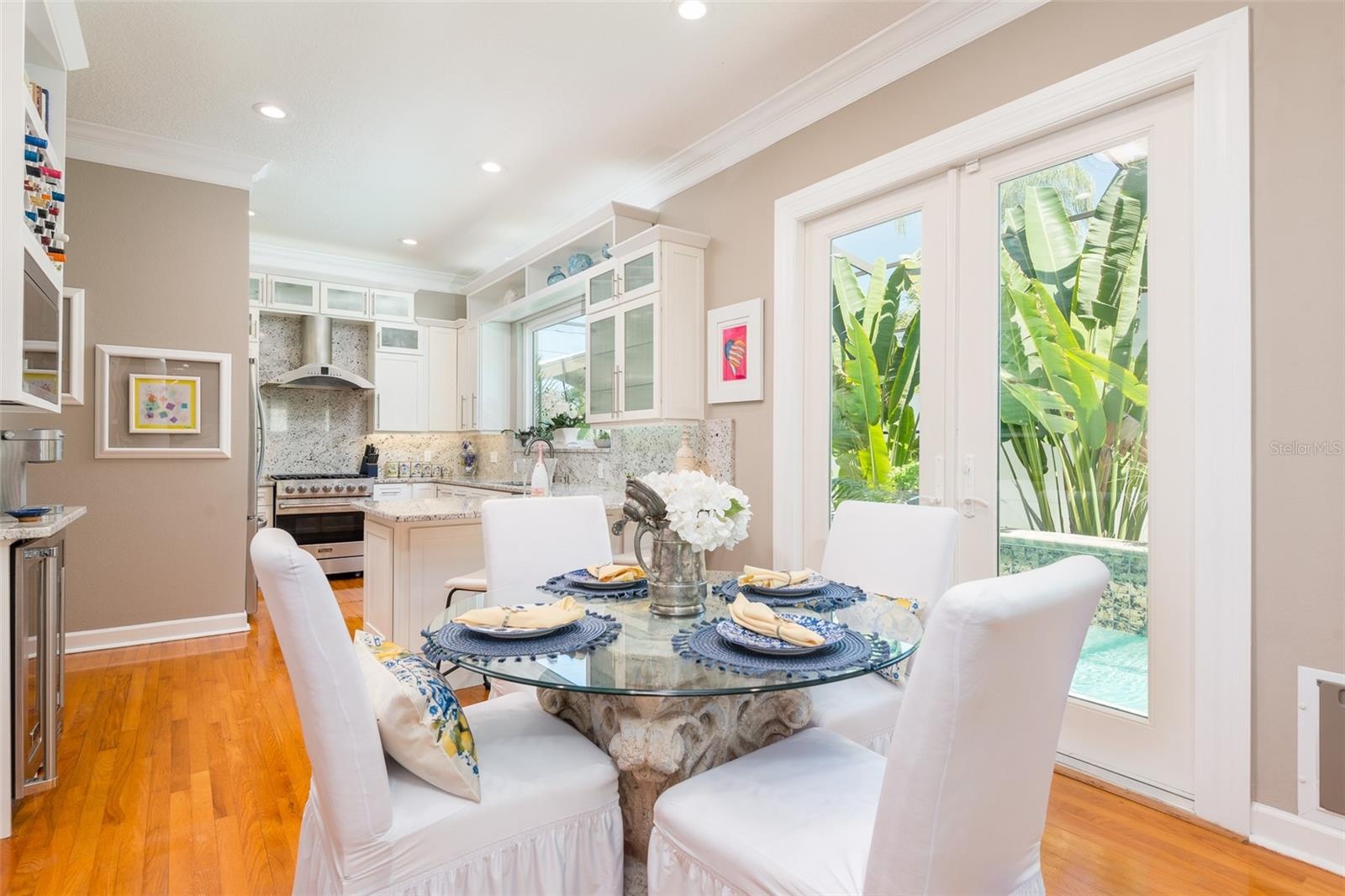 Breakfast room, built in wine rack, microwave, wine cooler and beverage refrigerator, open to kitchen