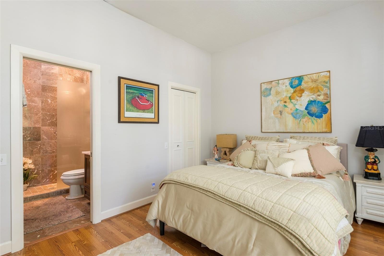 First floor guest bedroom 4 with walk in closet and en-suite....could be an additional primary suite