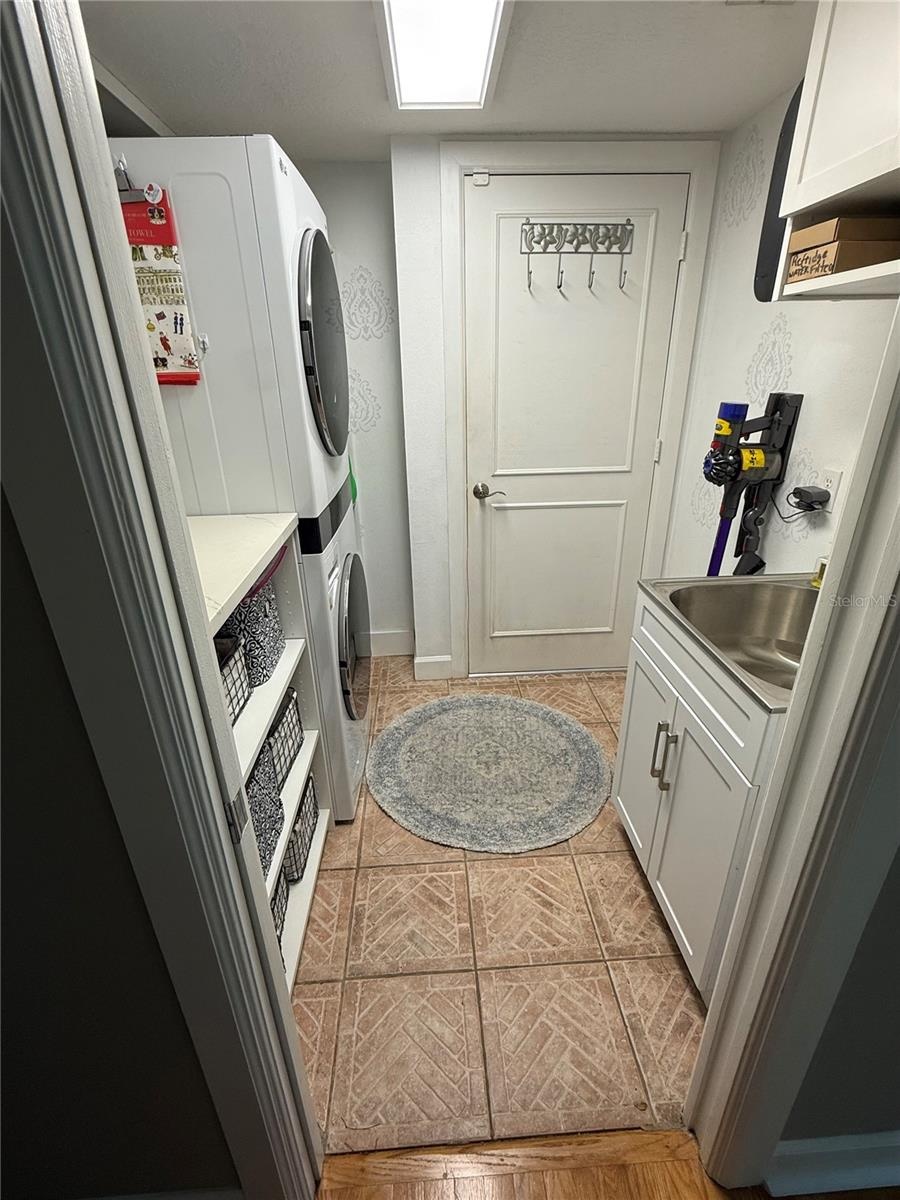 Laundry Room LG Tower, vanity and with utility sink