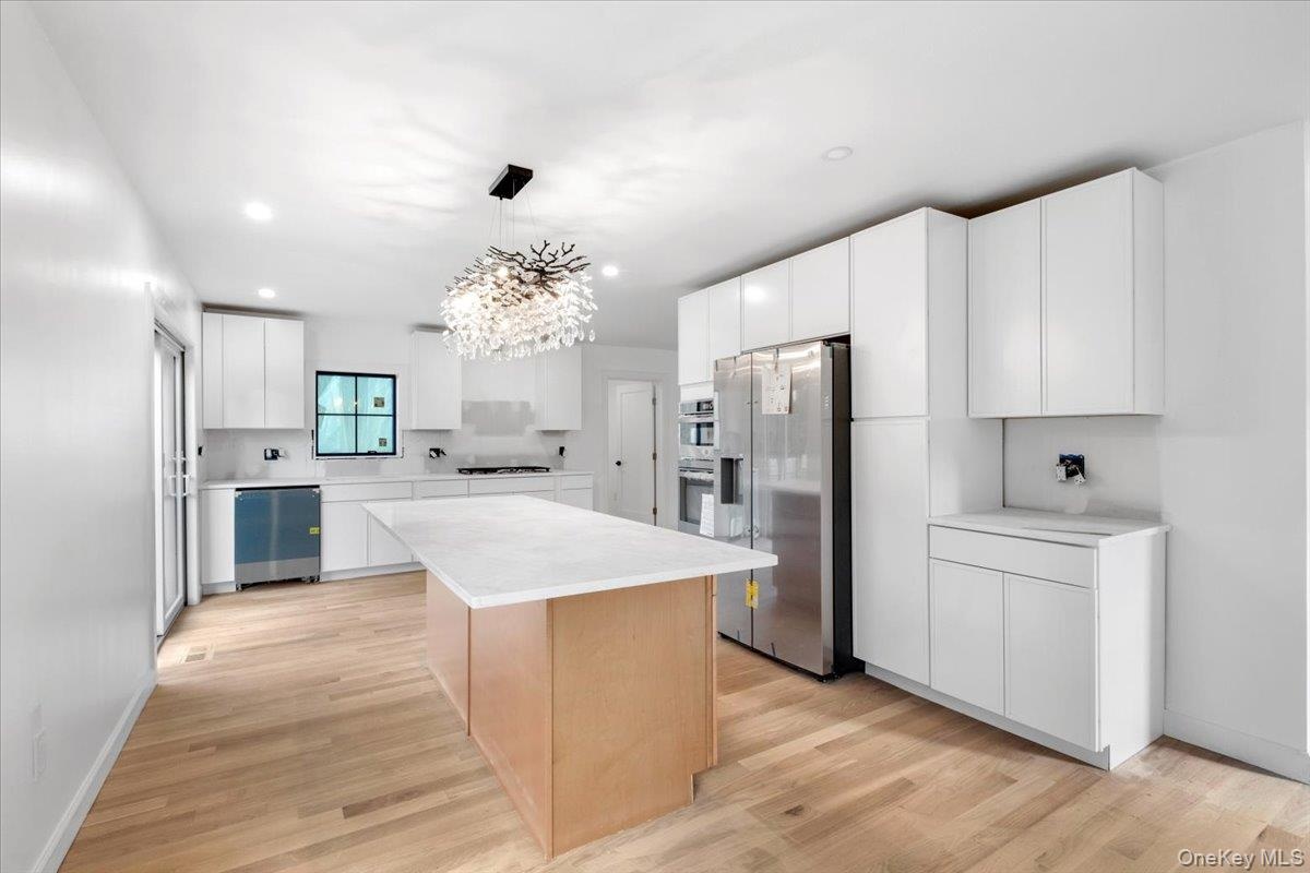 all new appliances and cabinets w/ quartzite counter tops