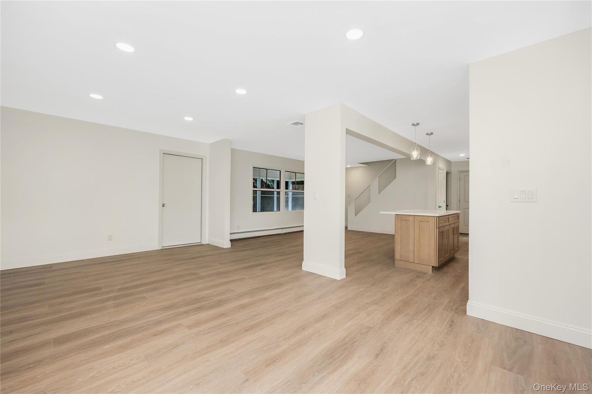 Open floor plan area LR/DR view into kitchen