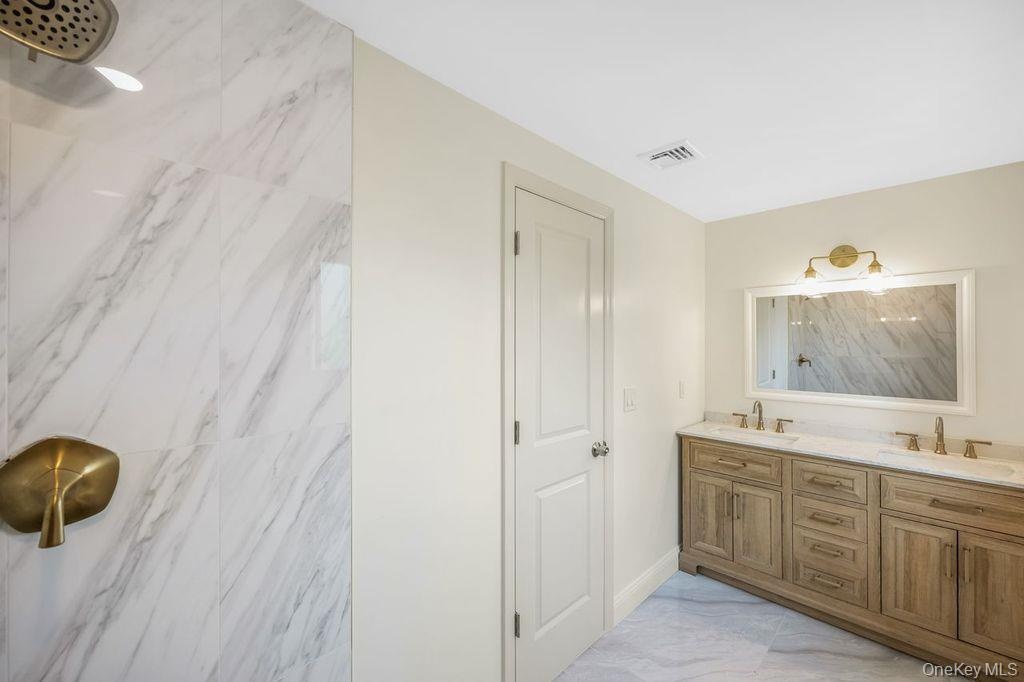 2nd level ensuite- Primary Bathroom Double Vanity and Shower
