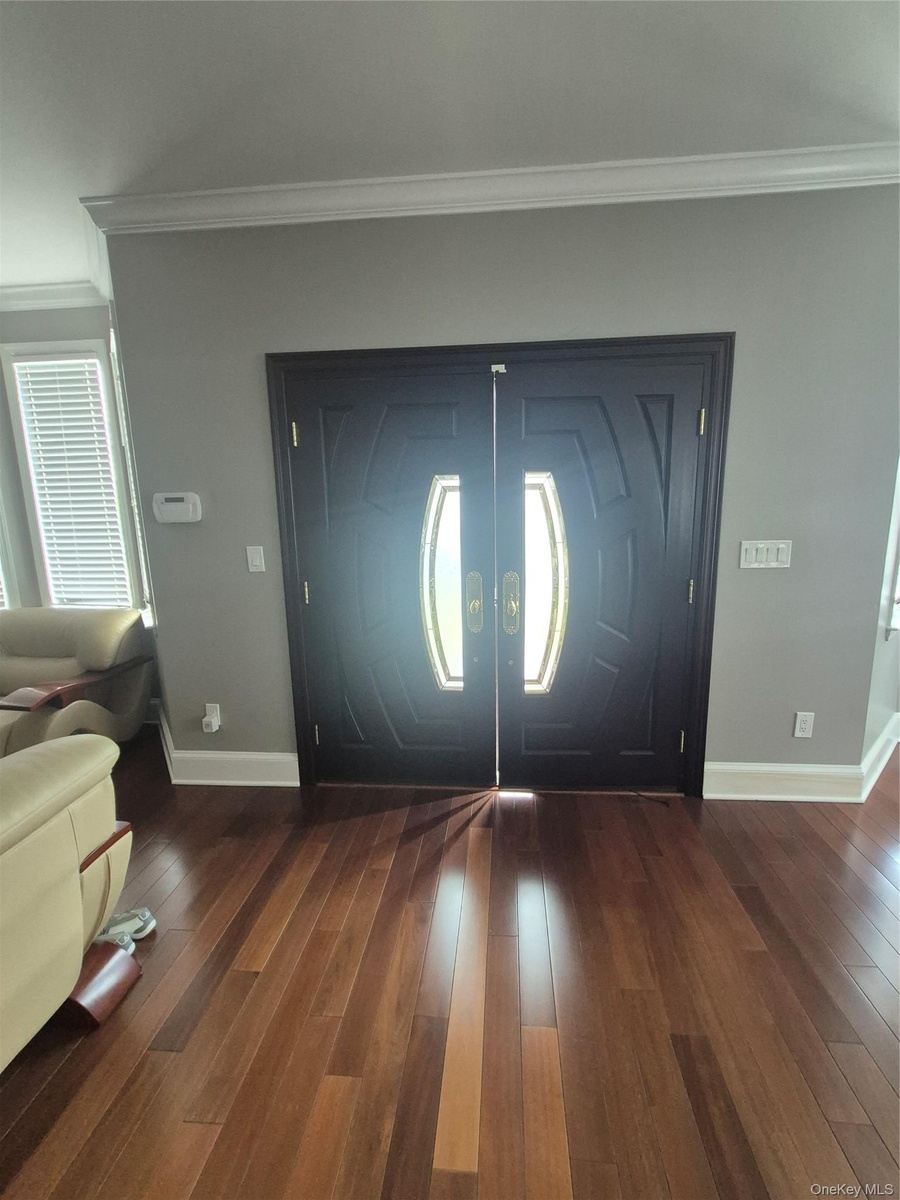 Double entry extra wide doors with decorative glass panels