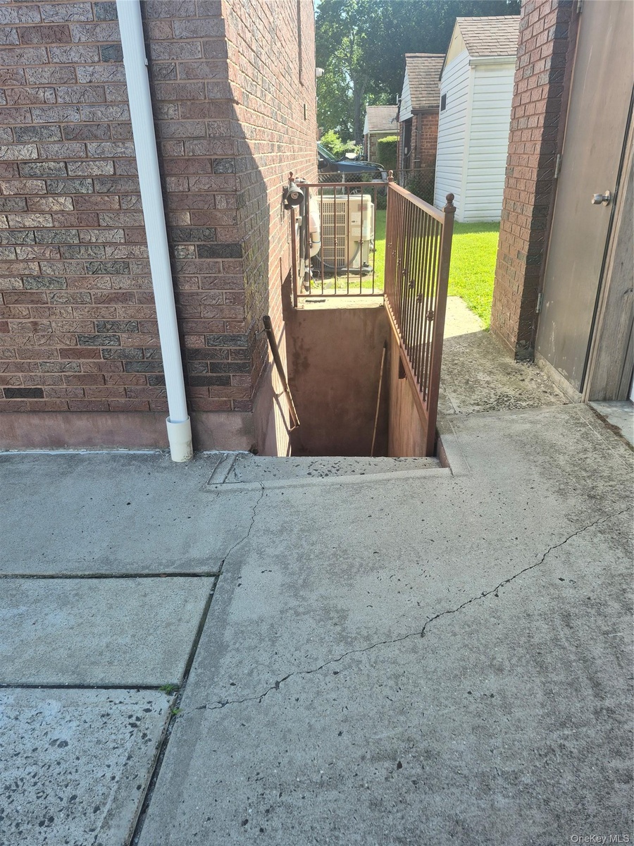 Entryway to basement on lower level (side view)