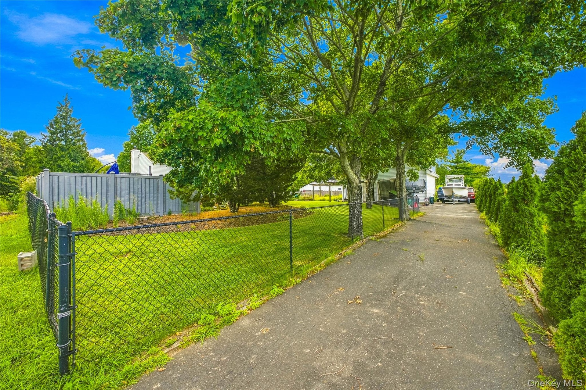 Private driveway for the guest cottage—quiet, convenient parking.