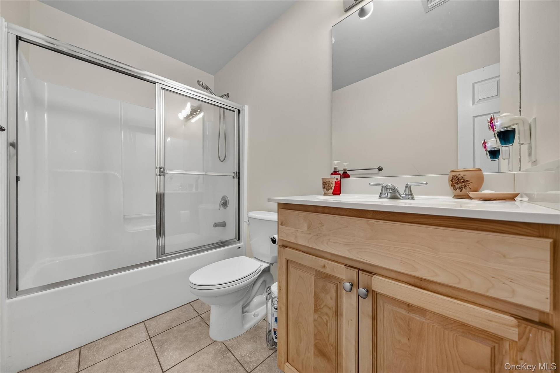 The guest bathroom has a tub/shower.