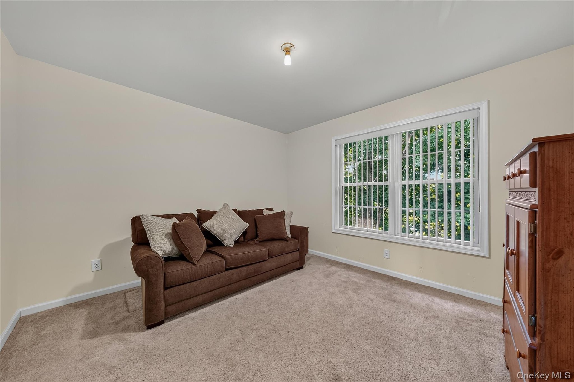 The third bedroom is currently used as a den and also has a double door closet.