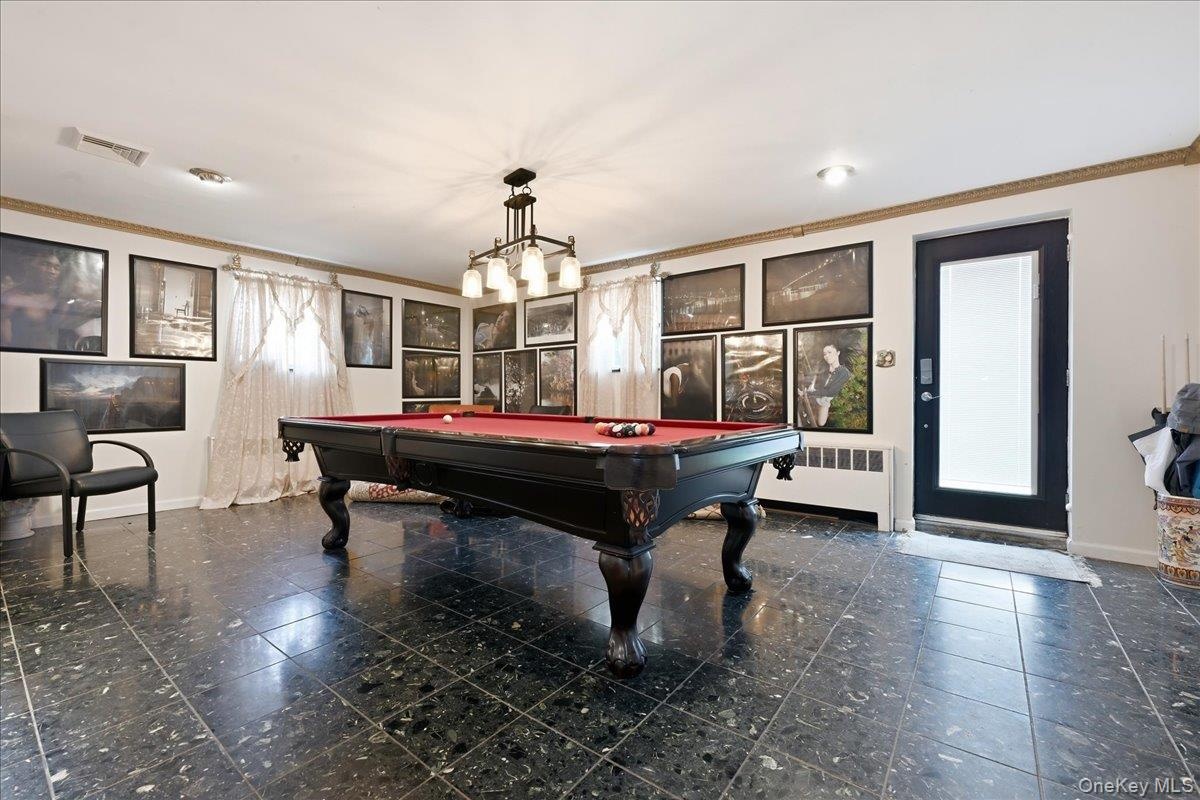 Huge Den with Separate Entrance, Half Bath and Garage Entry