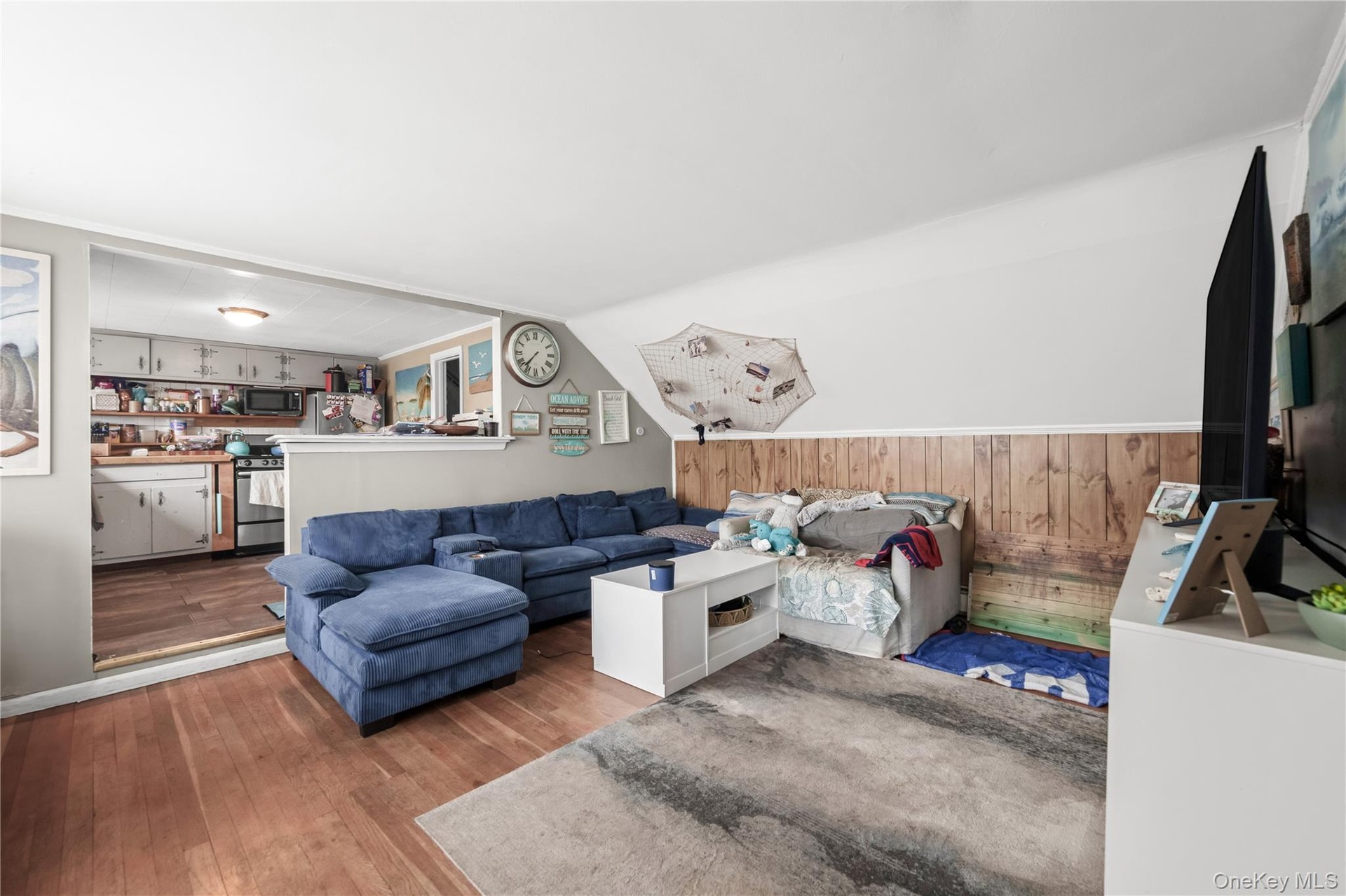 Unit 2 Living room Wood-finish flooring throughout