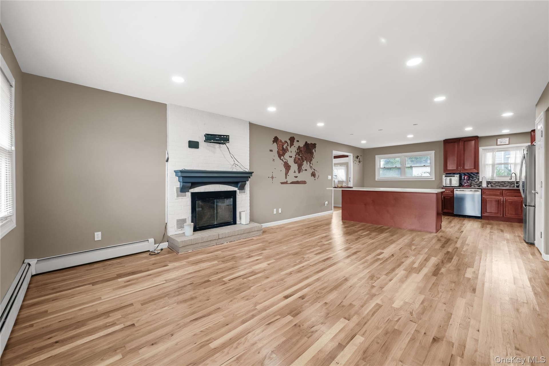 Open Concept Living Room and Kitchen Area with Center island and Breakfast Nook