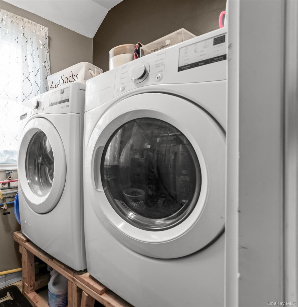Laundry area with two front-loading machines
