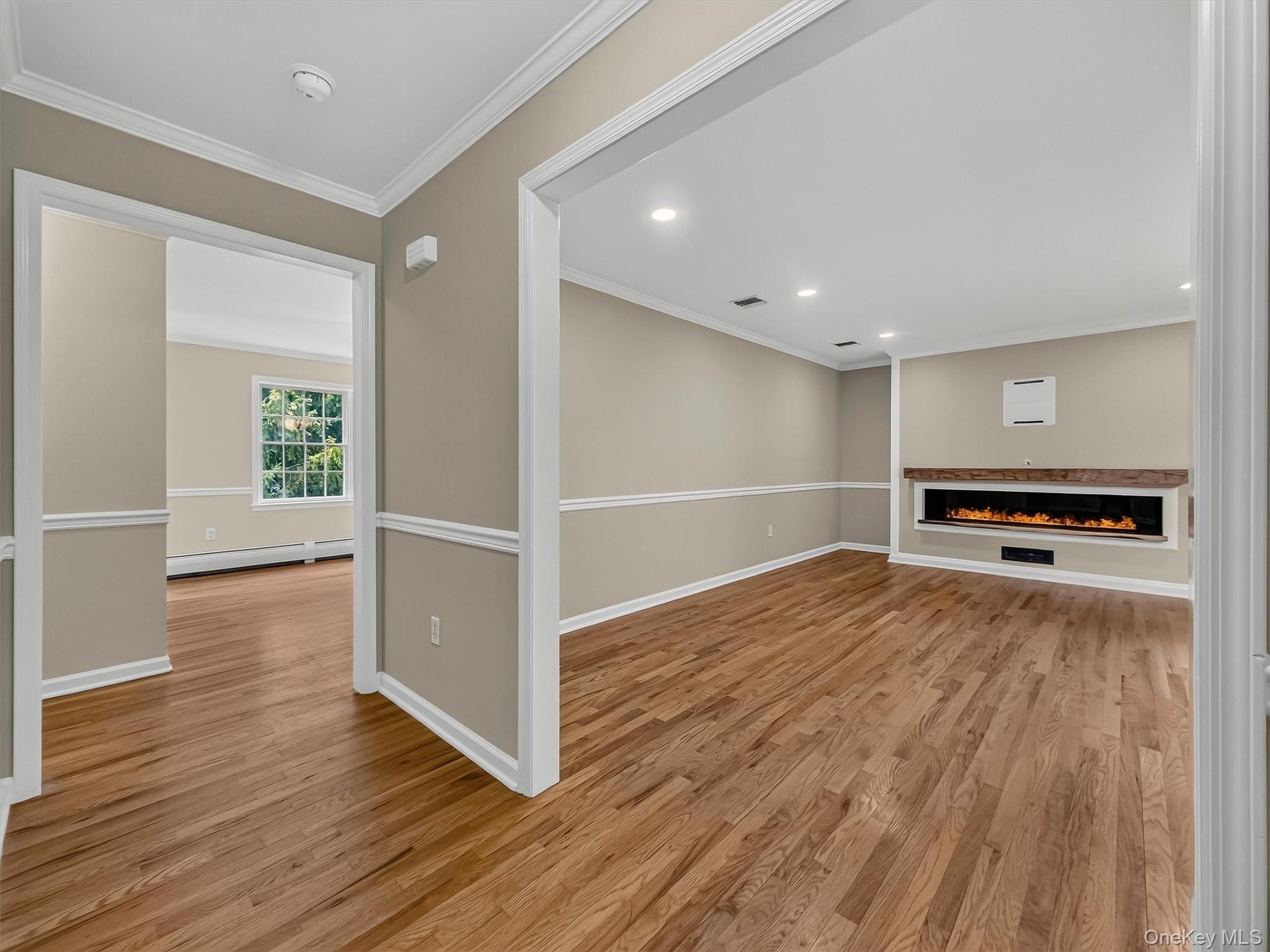 Custom trim work, and wide cased openings create an elegant flow while showcasing the exceptional craftsmanship found throughout the home.