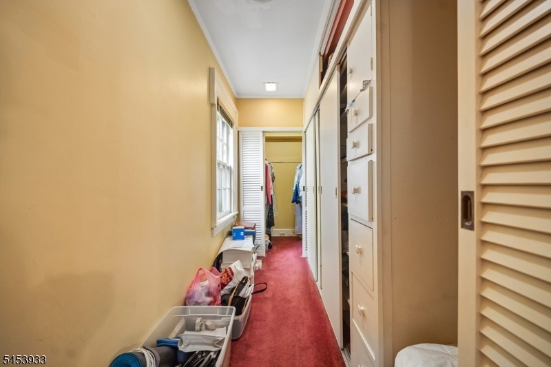 Primary Bedroom Walk in Closet