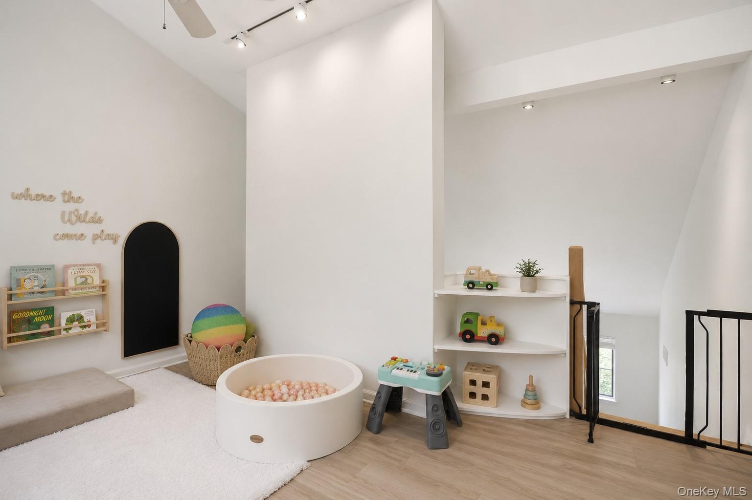 Upper level flex space with plenty of natural light.