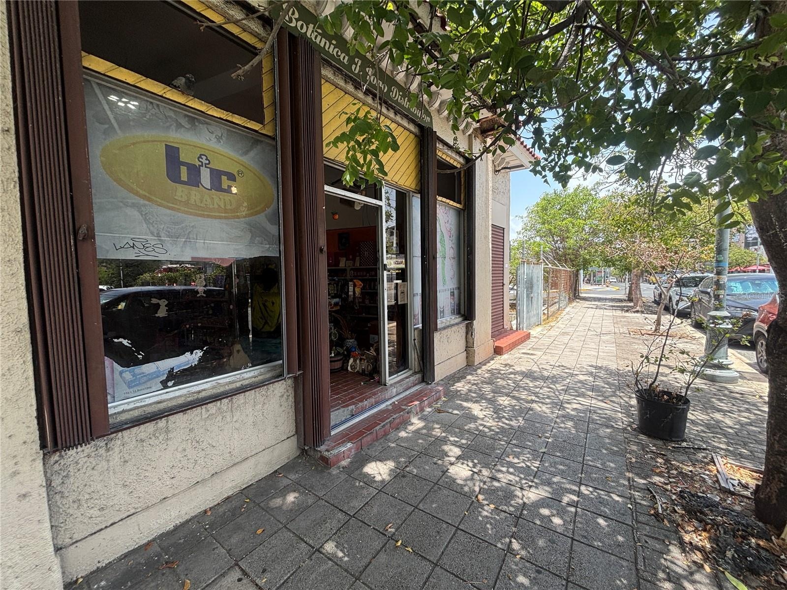 The small shutters area at the end is not part of this property.  Next to this, there is a gated stairway to a large privately owned parking lot.