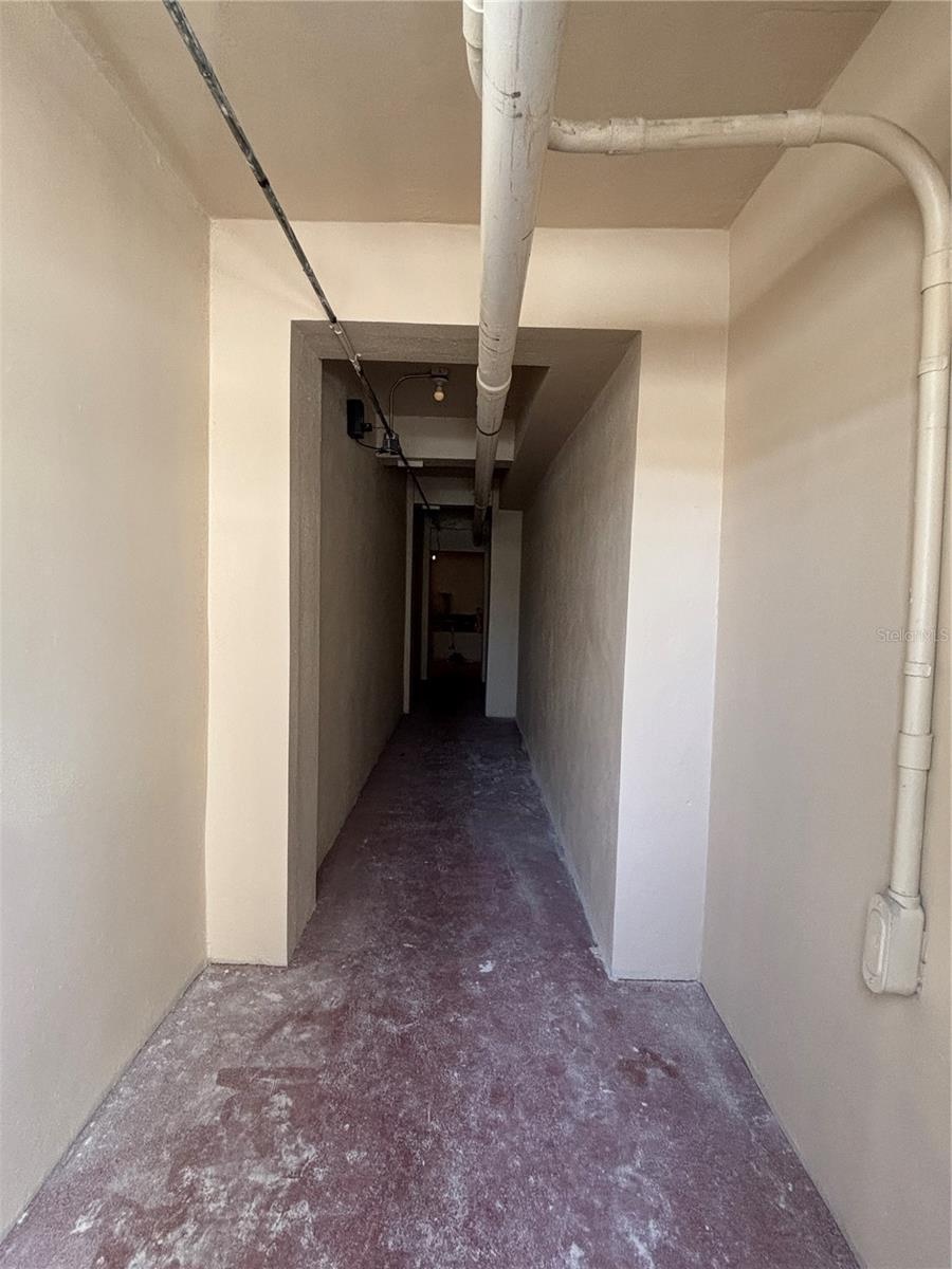 There is an entrance from the parking area to the building lobby. There is also direct access from the garage, warehouse and retail levels to the lobb