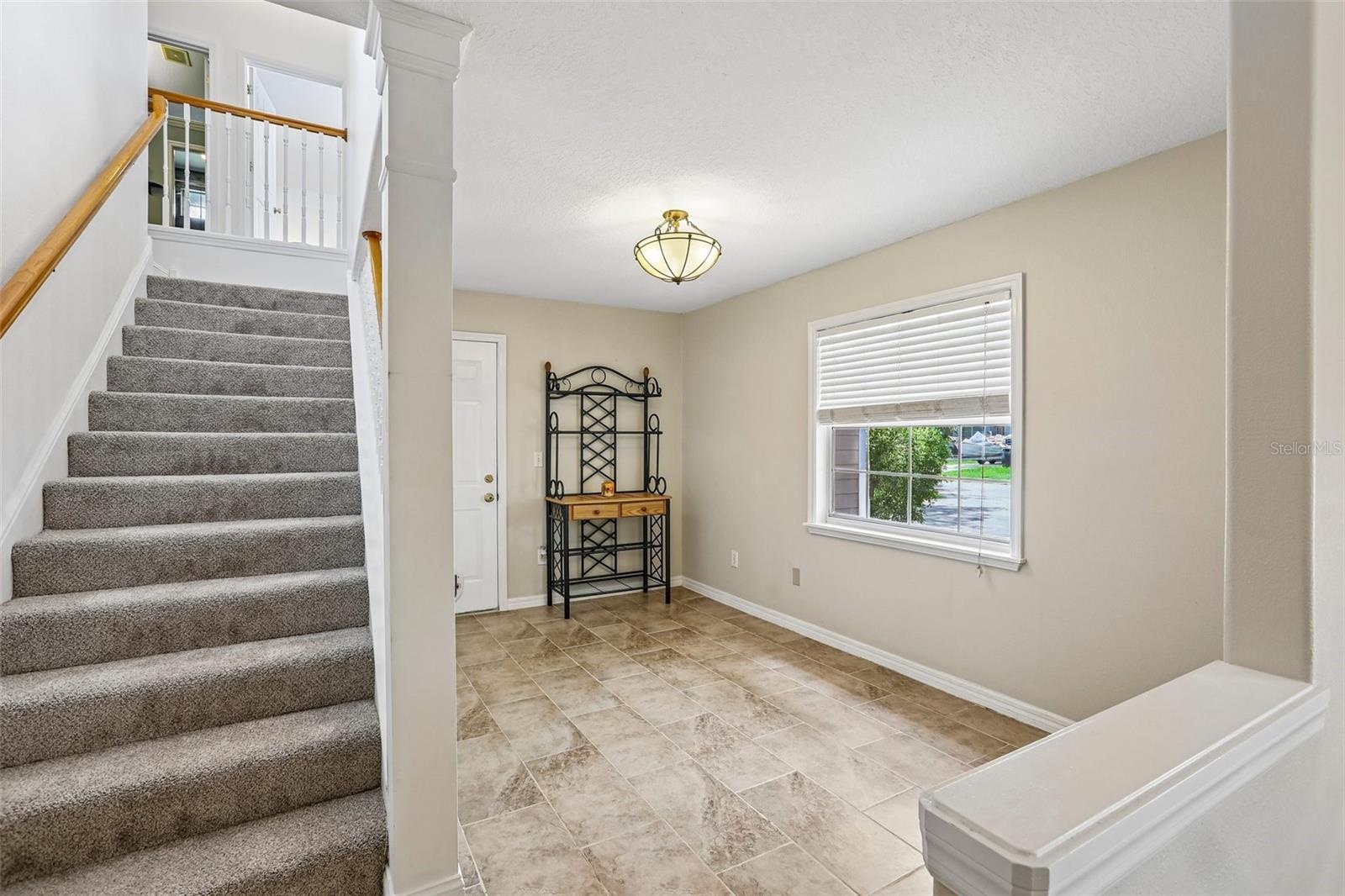 Second floor has 2 bedrooms, living room and full bathroom