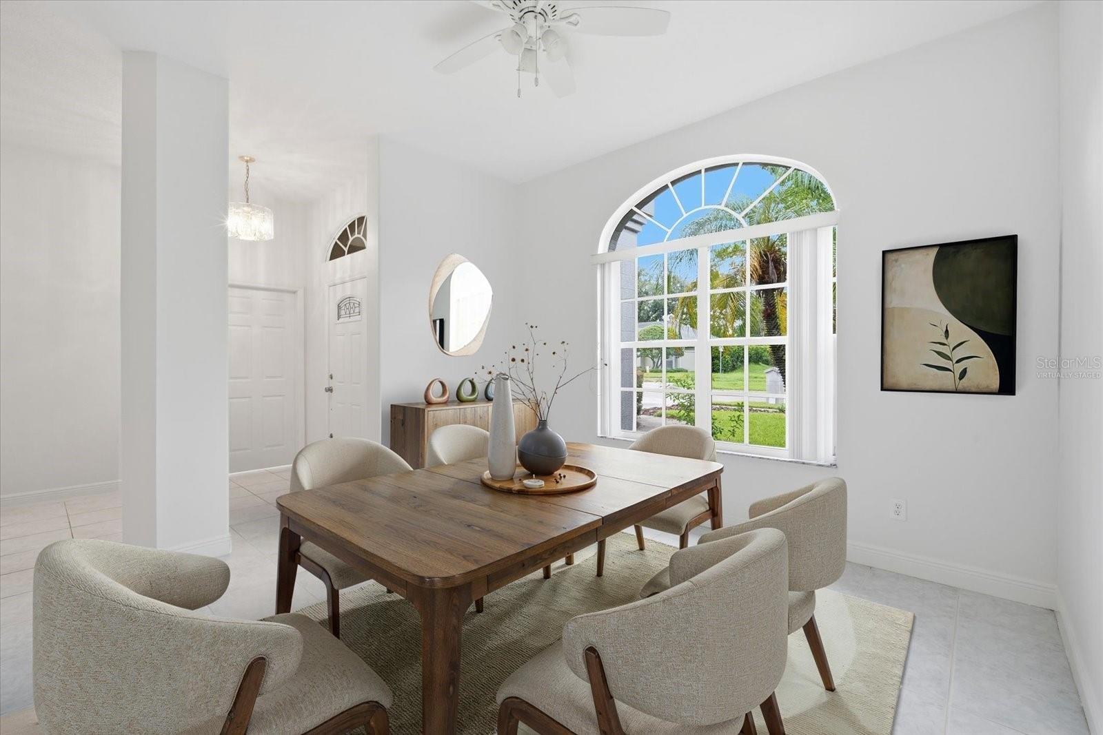 Virtually Staged Photo of formal Dining Room