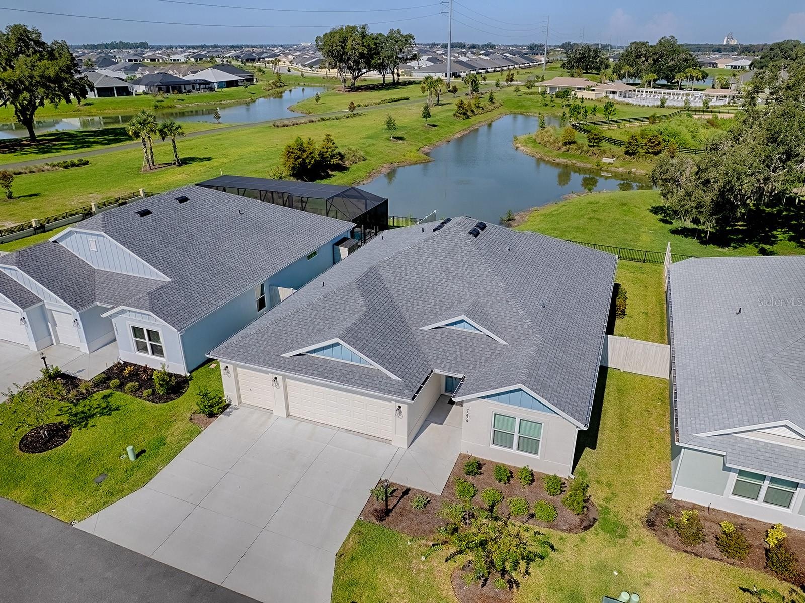 Right Side view of the house and the pond in the backyard