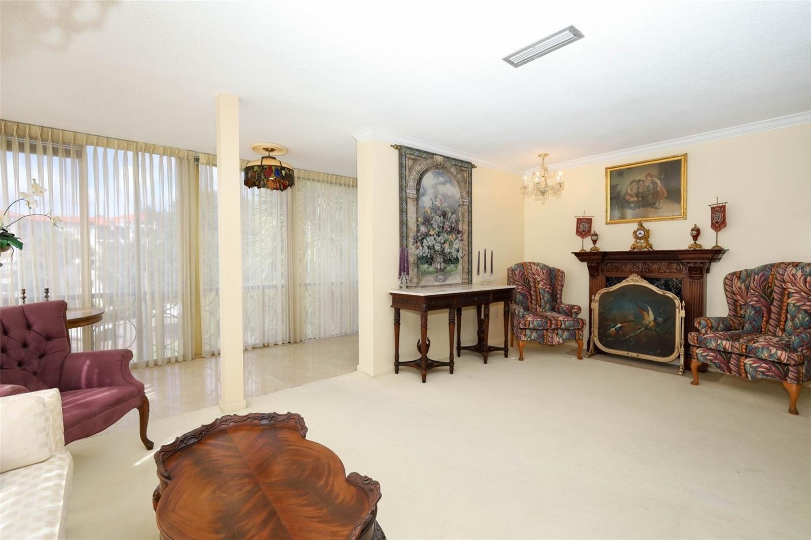 Living room & flex space with tiled floors.