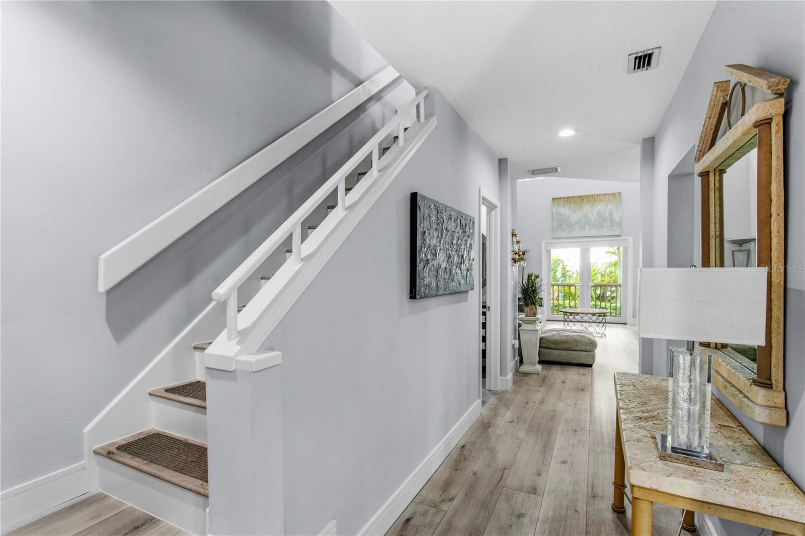 Upstairs, you’ll find two bedrooms along with a convenient laundry closet and linen closet.