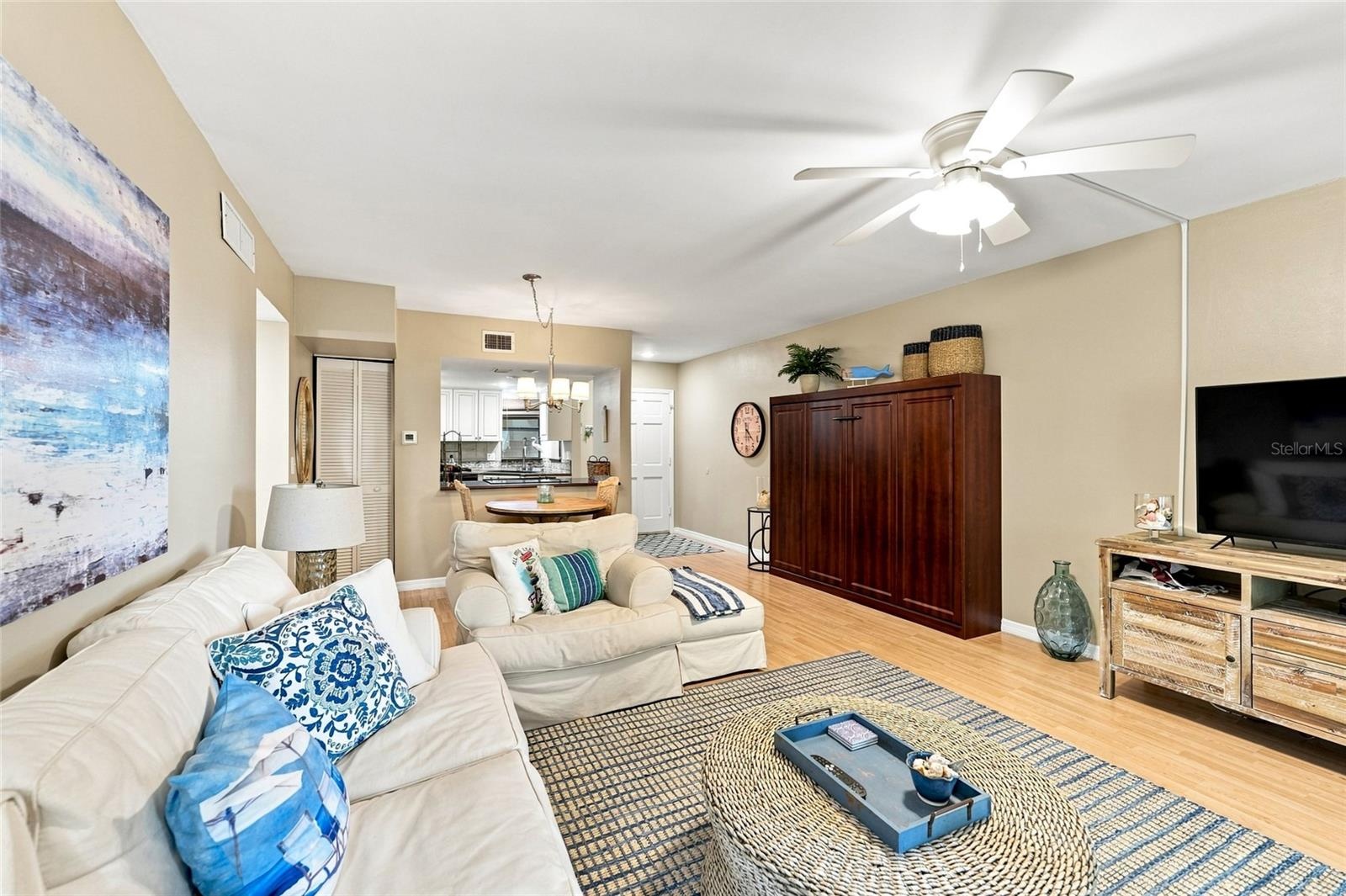 Living room with TV area and Murphy bed